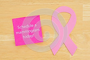 Reminder to schedule mammogram pink cancer ribbon