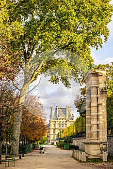 A remnant of the Tuileries palace in the Tuileries garden in Paris, France, and the Louvre palace in autumn