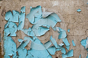 Remnants of blue paint on concrete wall