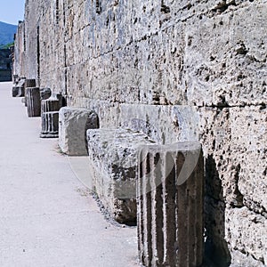 Remnants of classical columns in a street in Pompeii, Italy