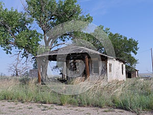 Dilapidated structure at Glenrio ghost town, an old mining town in New Mexico photo