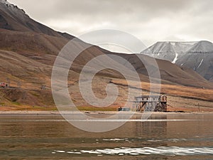 Remnants of the old coal mining installation in Isfjorden near Longyearbyen - the most Northern settlement in the world. Svalbard.