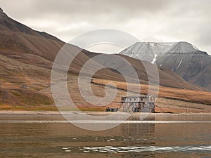 Remnants of the old coal mining installation in Isfjorden near Longyearbyen - the most Northern settlement in the world. Svalbard.