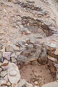 Remnants of tombs at pre-Columbian fortification Pucara near Tilcara village in Quebrada de Humahuaca valley, Argenti