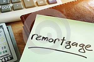 Remortgage concept. Calculator and money. photo