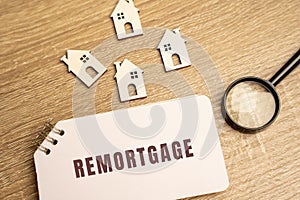 Remortgage concept. Process of paying off your mortgage with the proceeds from a new mortgage using the same property as security photo