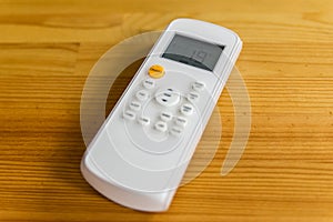 Remote air condition on wooden background