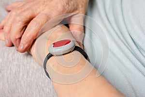 Remote assistance bracelet for seniors photo