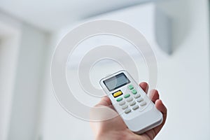 Remote control for air conditioner in hand