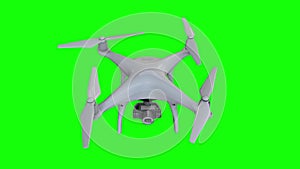 Remote control air drone drone flying with action camera. Isolated on green screen background