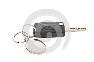 Remote control car key with metal keyring on isolated white