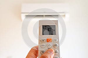 remote control command for air conditioning to be handled point to the device with the order to 30°C