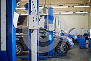 Remote control of electric lift in car-care service