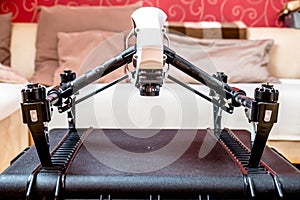 Remote control fly drone unit standing on hardcase