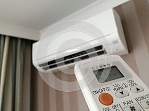Remote control pointing at air conditioner