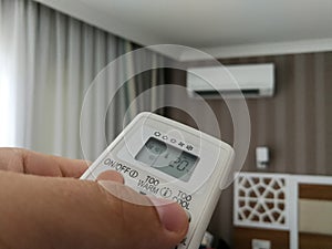 Remote control pointing at air conditioner