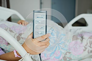 remote control to adjust the level of the hospital bed