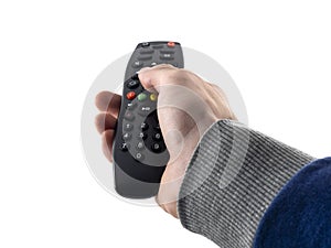 Remote control TV in a man`s hand