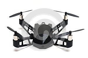 A remote controlled flying drone with four propeller rotors and spy camera on board photo