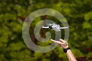 remote-controlled helicopter with four rotors and camera