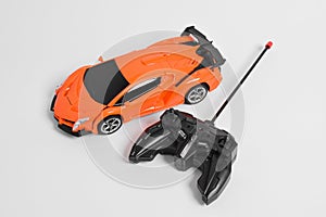 Remote controlled toy car with a game controller