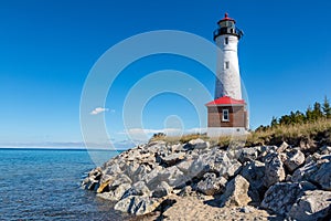 Remote Crisp Point Lighthouse on the rocky shores of Lake Superior, USA