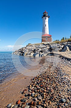 Remote Crisp Point Lighthouse on the rocky shores of Lake Superior in Michigan, USA
