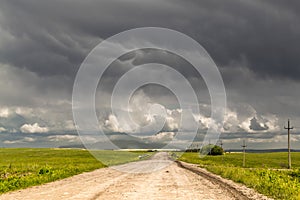 Remote Dirt Track Leads to Stormy Horizon