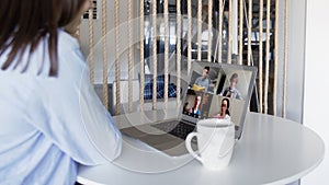 Remote employee conferencing in online group virtual chat on laptop screen. Company staff colleagues and boss using pc