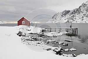 Remote house in coastal landscapeSkjelfjord Flakstadoya Loftofen Norway