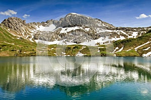 Remote lake up high in the alpine mountains. Schrecksee.