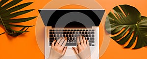 remote office computer laptop orange background business leaf hand keyboard palm. Generative AI.