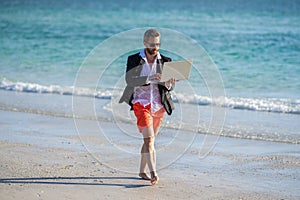 Remote summer work. Freelance concept and summer travel. businessman summer vacation. businessman in suit remote working