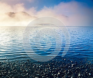 Remote Tagish Lake misty landscape Yukon T Canada