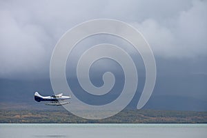 Remote travel by float plane, landing and taking off on Nak Nak lake, Katmai National Park, Alaska