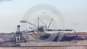 Remote view of a Bucket-wheel excavator on the top level of an open cast brown coal pit