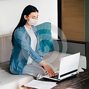 Woman working from home during epidemic