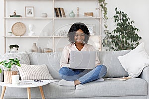 Remote Work. Millennial african american woman working on laptop at home