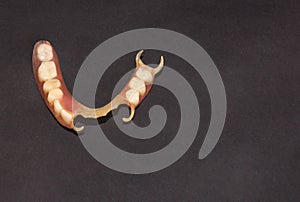 Removable dentures flexible, devoid of nylon, hypoallergenic exempt from monomer. photo