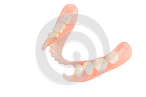 Removable plastic denture