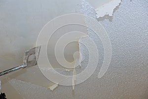 Removal old dirty popcorn ceiling wall background