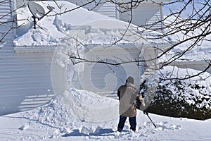 Removal of snow from a house roof