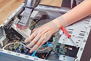 Remove dust from hard disk drive of desktop PC using vacuum cleaner.