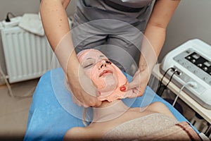 Remove face mask after cometological procedures. close up