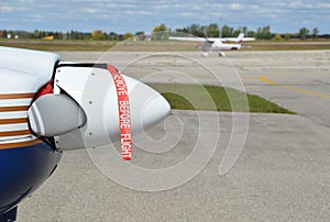 Remove before flight banner attached to propeller