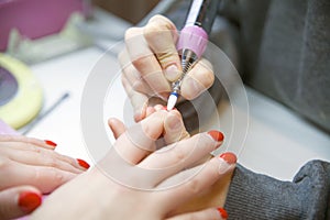 Remove Old Nail Polish, manicure. Milling of nails. Removing the nail plate with a milling machine