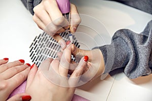 Remove Old Nail Polish, manicure. Milling of nails. Removing the nail plate with a milling machine