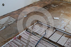 Remove polystyrene wood panels from the floor with tools