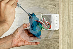 Check the voltage with a screwdriver.