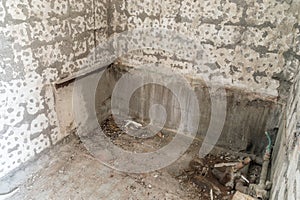 Removed old tiles in toilet